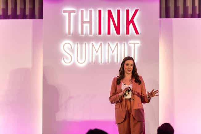 Rachel Cowlishaw on stage at Think Summit Europe, 2023